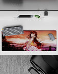 32x12 inches anime girl mouse pad in warm apricot sky, rosy reds and gold glow, dreamy soft vibes.