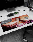 Wind-tossed hair anime girl desk pad 36x16 inches featuring a shy glance over a glowing coastal city.