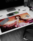 40x20 inches anime girl desk pad with shy glance and wind-tossed hair against a sparkling seaside city sunset.