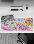 32x12 inches pastel kawaii desk mat in pink, lavender, and gold with sparkly sweets vibe and cute anime style.