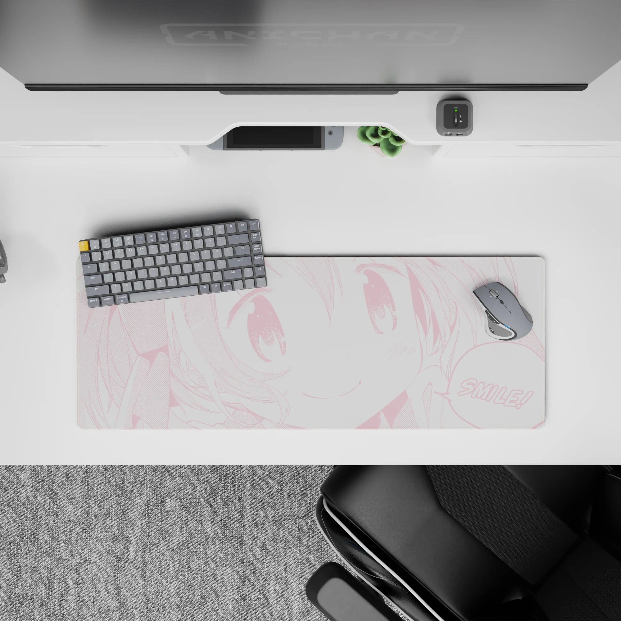 Pastel pink monochrome kawaii anime desk mat with blush dots and sparkly eyes, 32x12 inches.