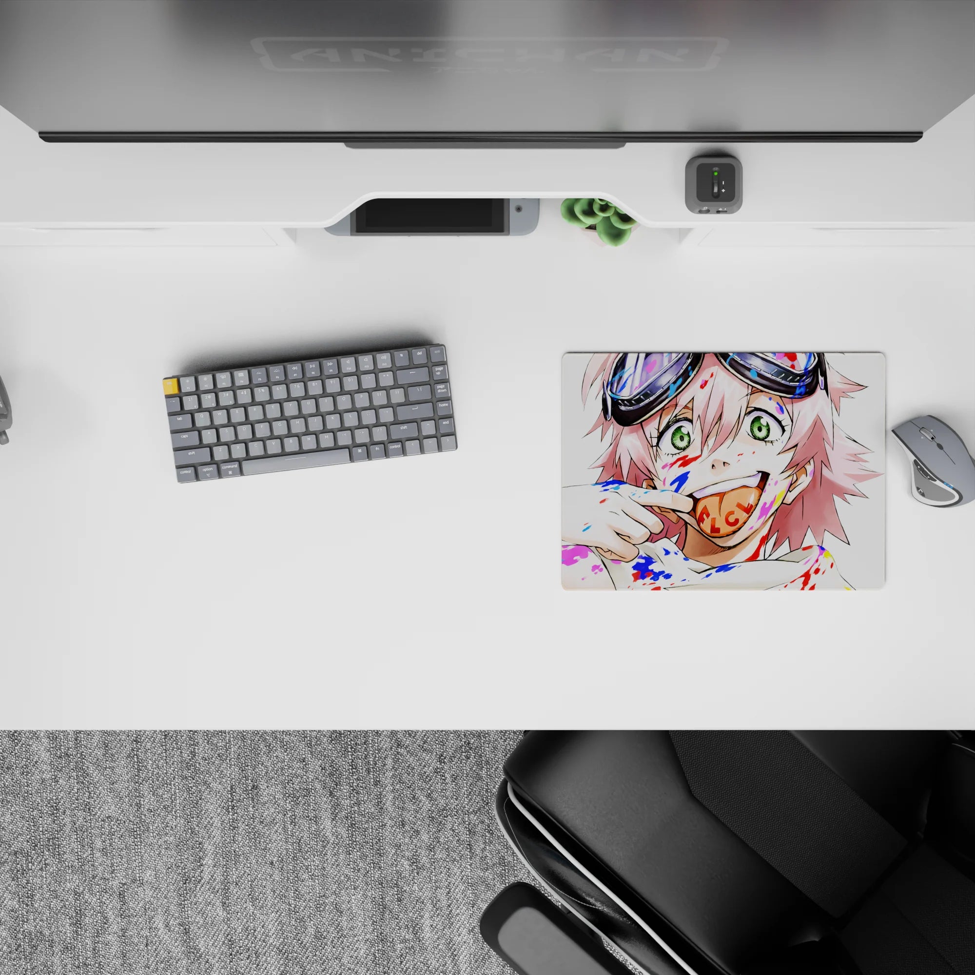 Vibrant 14x10 inches anime mouse pad in candy reds and electric blues, chaotic cute art riot mood.