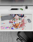 32x16 inches desk mouse pad in candy reds and electric blues, chaotic-cute vibe with bold brush strokes.
