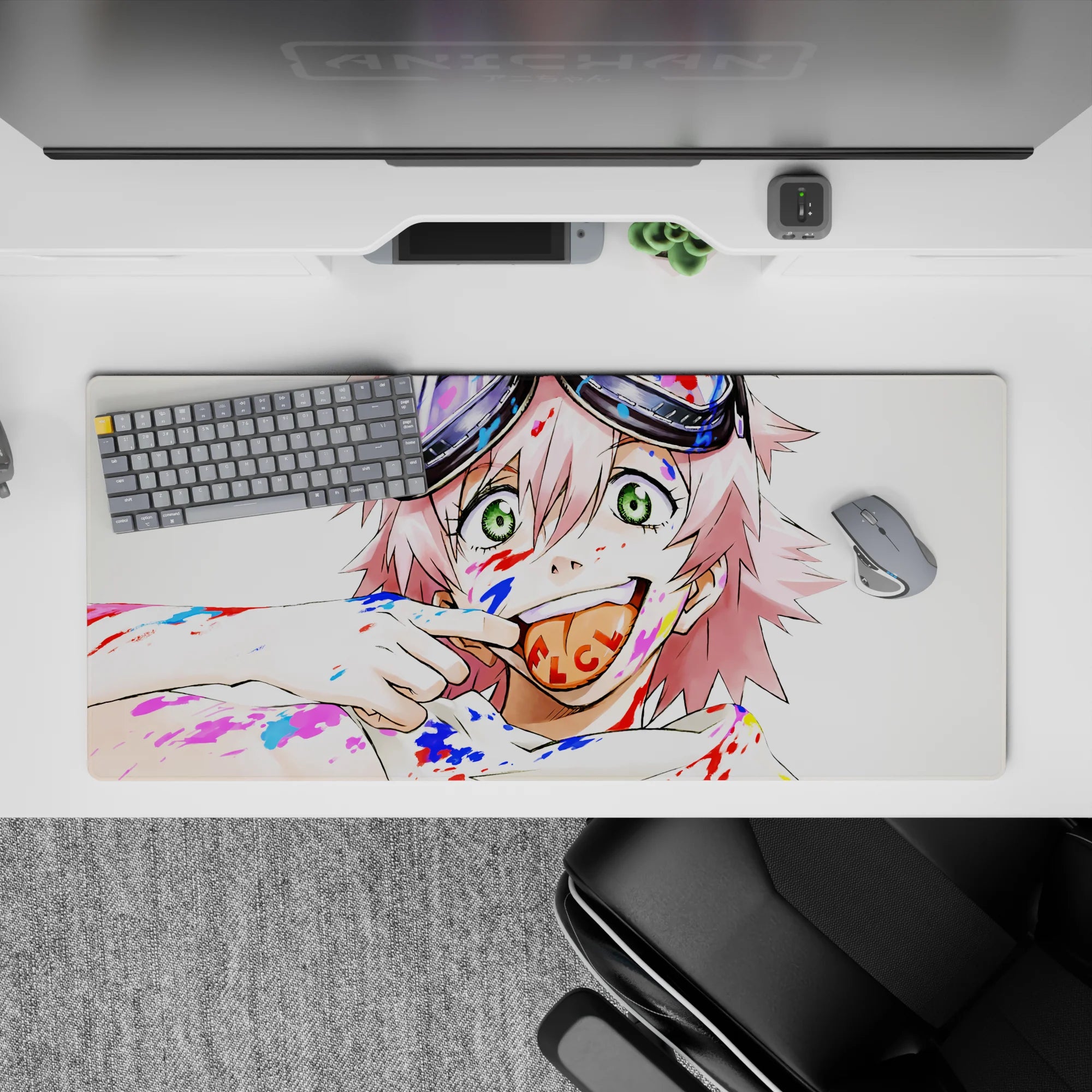Chaos-cute 36x16 inches anime desk pad in candy reds and electric blues with messy brushstroke vibes.