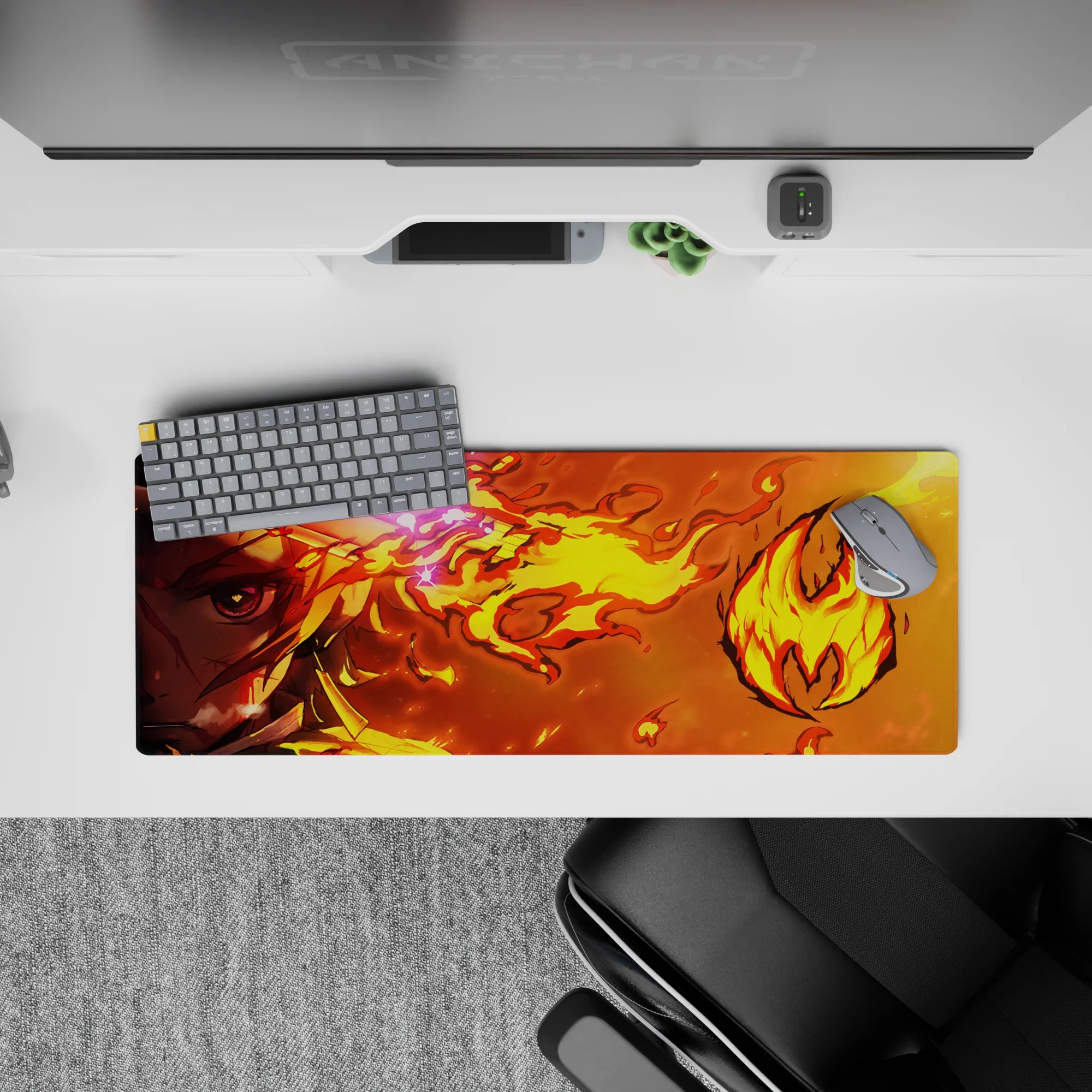Anime mouse pad 32x12 inches featuring Rengoku from Demon Slayer with vibrant flames in golden yellows and blood oranges.