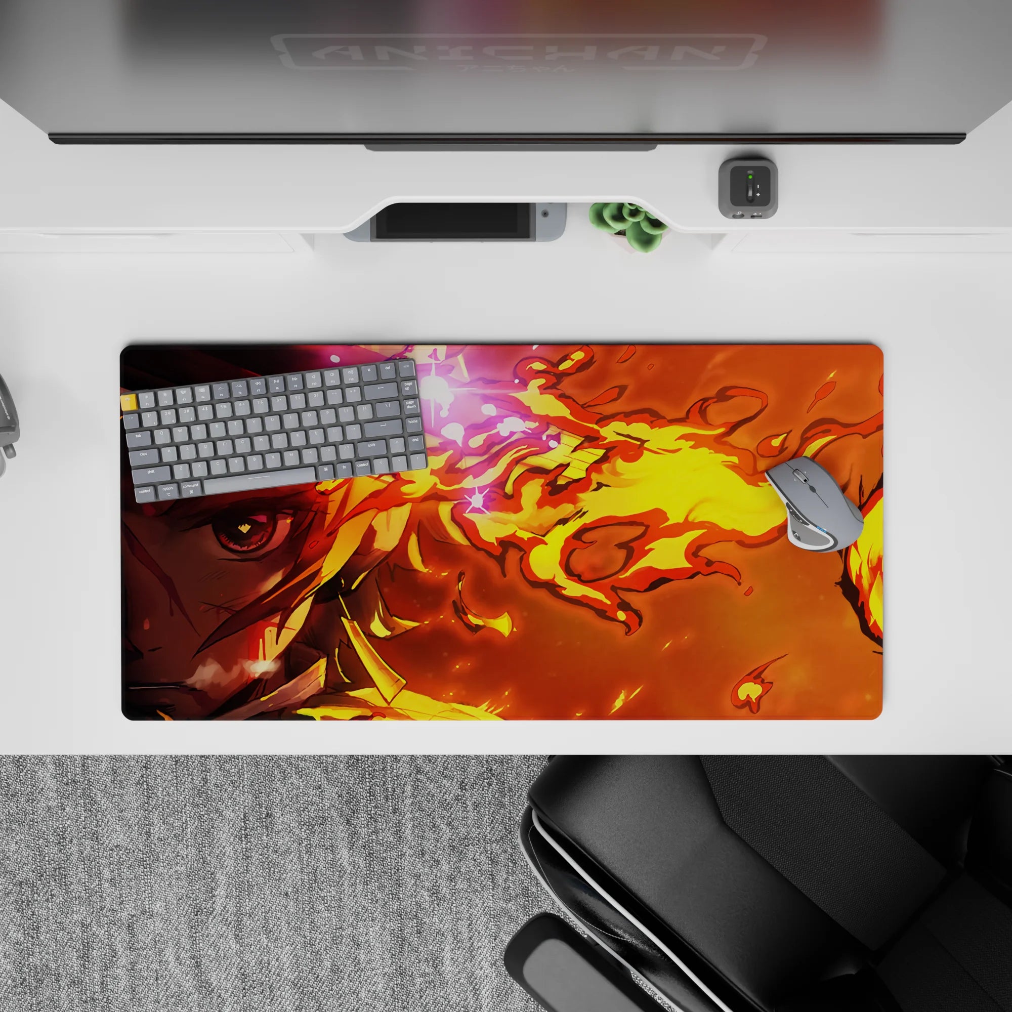 Rengoku themed 32x16 inch anime mouse pad, featuring fiery hues of yellow and orange, perfect for adding bold flair to any desk.