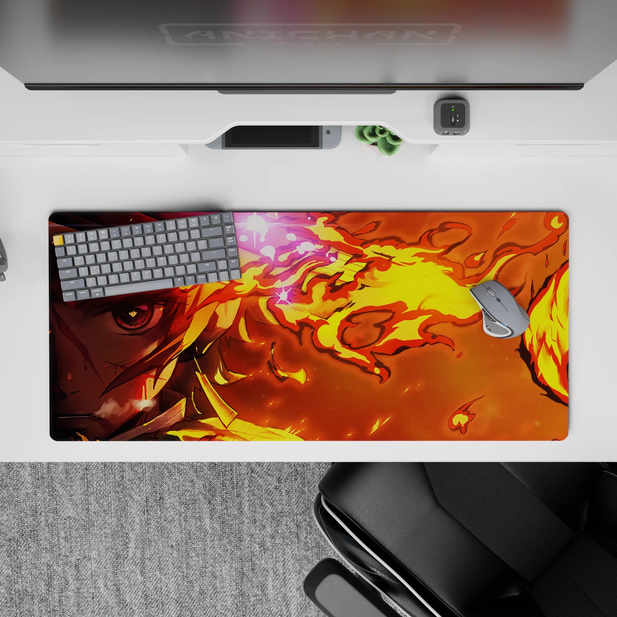 Rengoku anime desk pad 36x16 inches with fiery yellows and oranges, featuring his fierce gaze amidst blazing flames.
