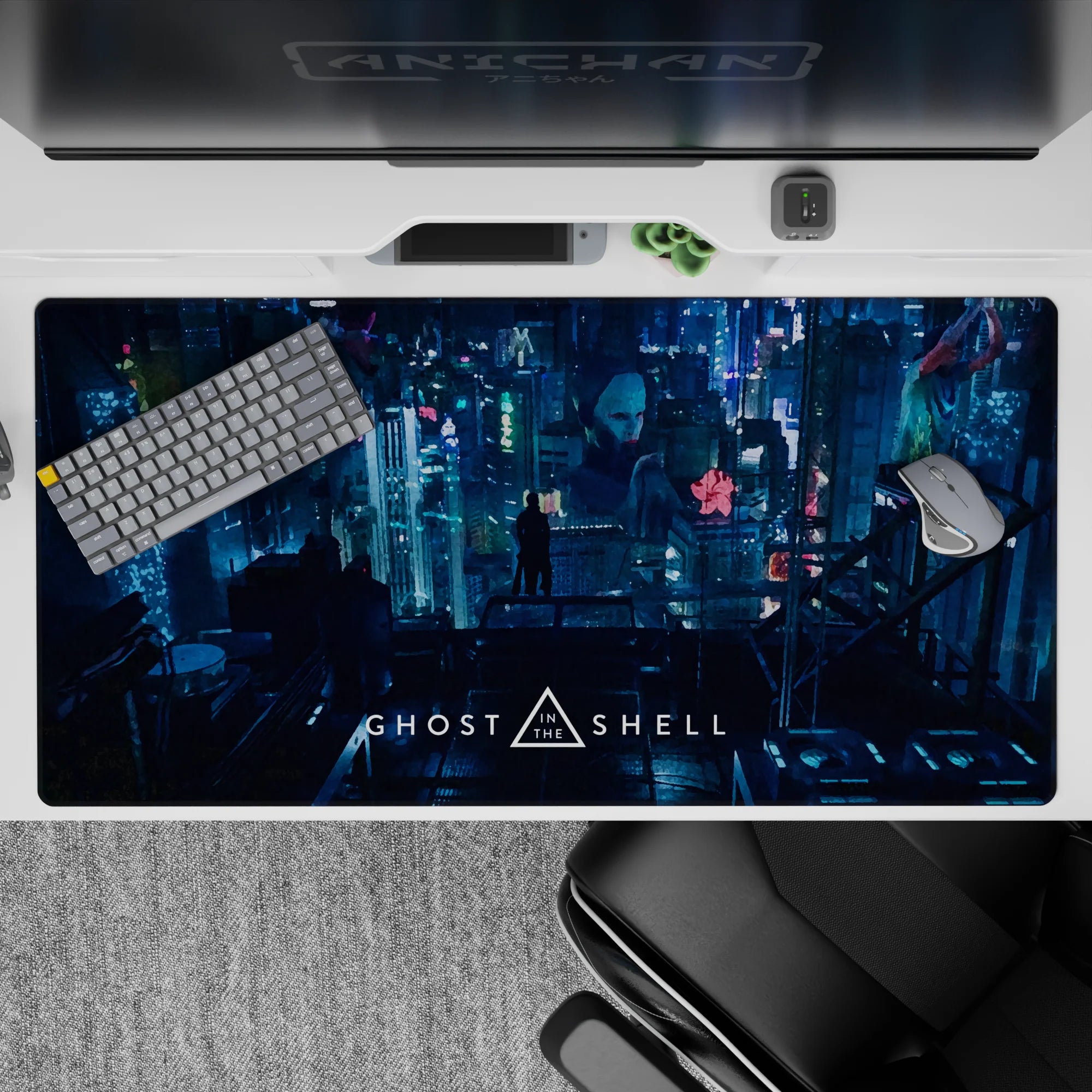 Neon rain, deep teal shadows, and pink-blue billboards on a cyberpunk anime desk pad 40x20 inches.