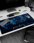 Lone rooftop figure overlooking glowing kanji and holograms on an anime desk pad 40x20 inches.