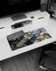 Armored blue-haired anime heroine with oversized cannon on mouse pad 28x12 inches, dramatic backdrop.