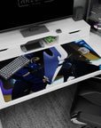 Anime mouse pad 40x20 inches featuring Kirito battling Minotaur boss with glowing swords, deep indigos, and electric blues.