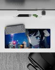 28x12 inches anime desk mat in neon blues and soft golds, cozy winter drama vibe with falling snow.