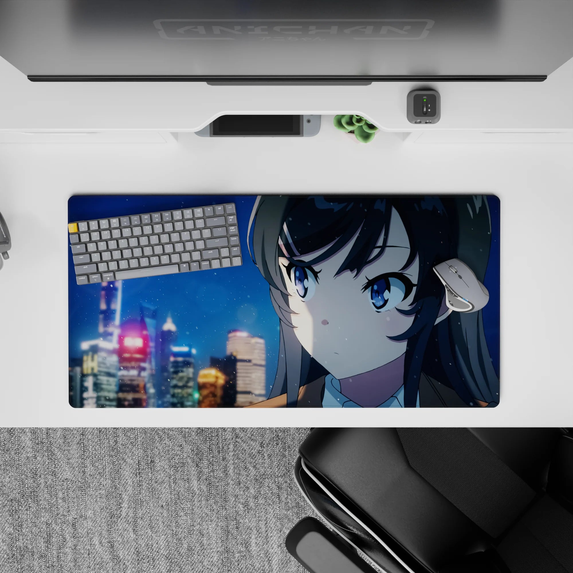 32x16 inches anime desk mat in neon blues and soft golds, cozy winter-night mood with drifting snow.