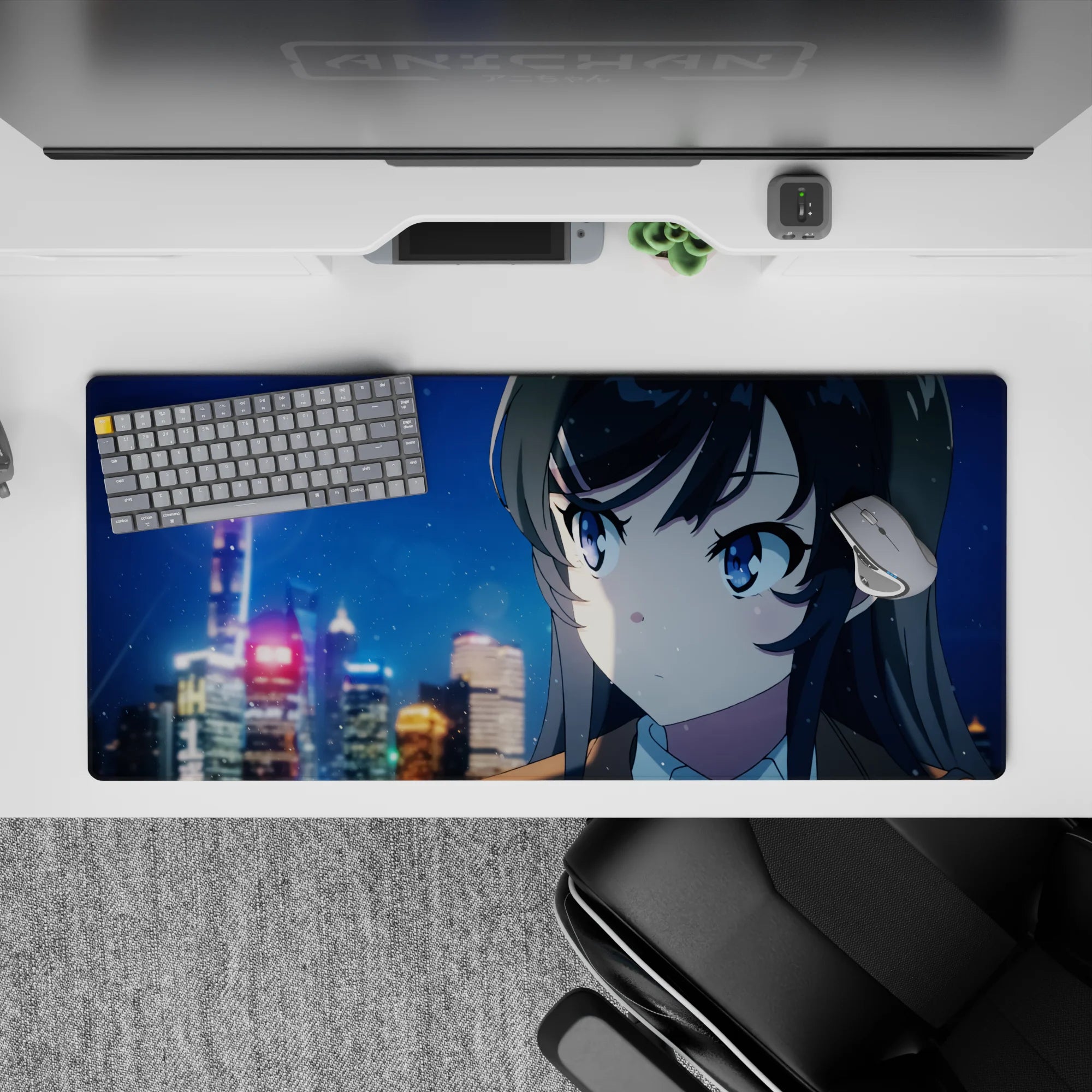 36x16 inches anime desk pad in neon blues and soft golds, cozy winter-night drama vibe with drifting snow.