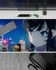 Anime girl desk pad 40x20 inches in neon blues and warm golds, cozy winter drama mood and glow.