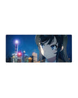 28x12 inches anime girl mouse pad with snowy city night skyline, neon streetlights, smooth tracking.