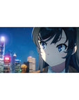 Anime girl desk pad 40x20 inches with snowy city night skyline, neon lights, and soft falling flakes.