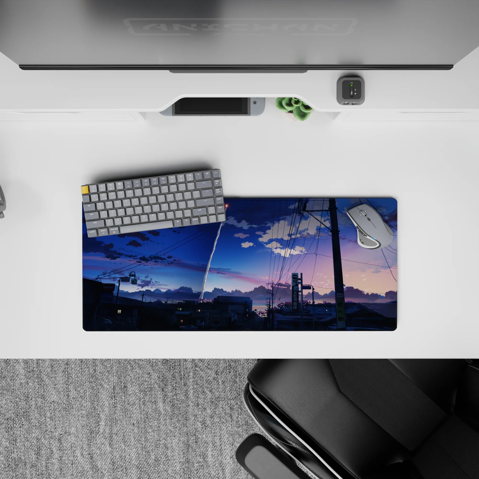 28x12 inches anime mouse pad in cobalt-to-peach sunset gradients, calm cinematic sky with bright white streak.