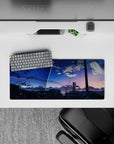 28x12 inches anime mouse pad in cobalt-to-peach sunset gradients, calm cinematic sky with bright white streak.