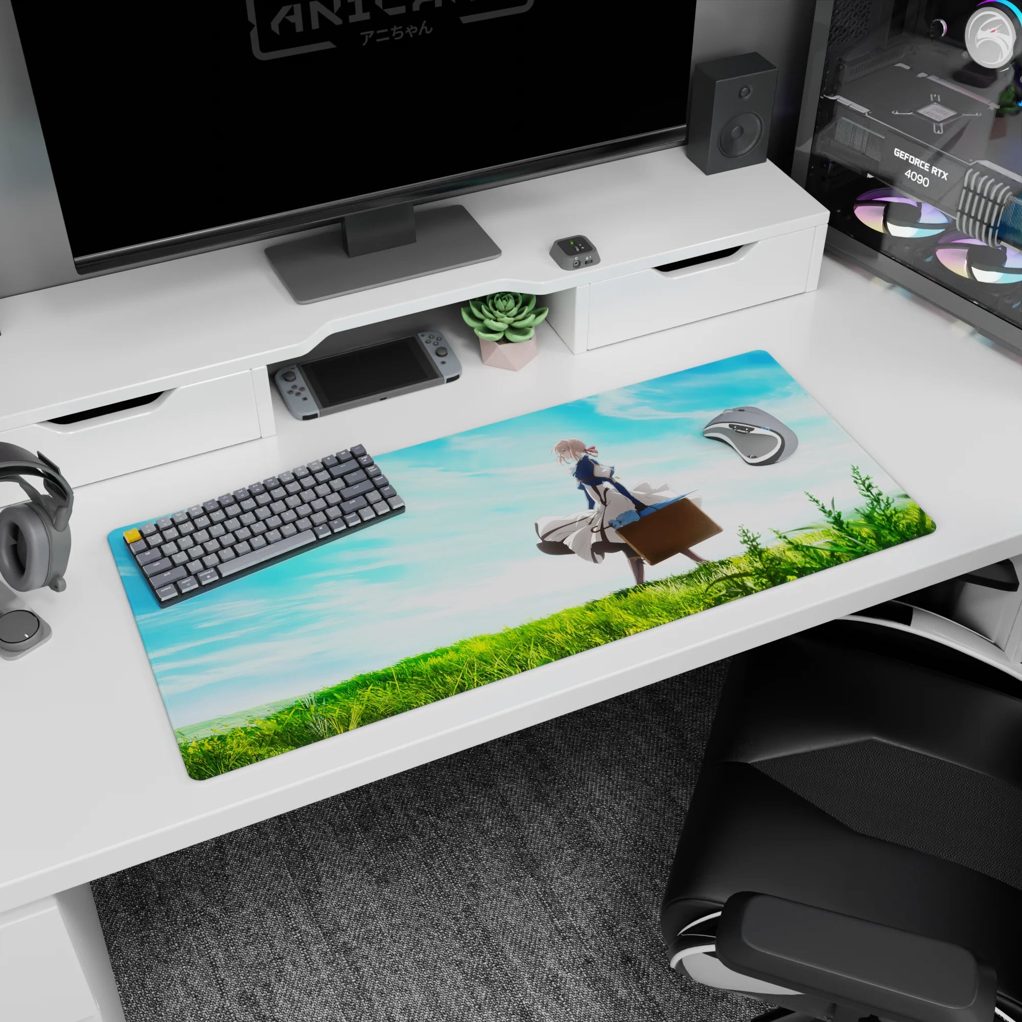 36x16 inches desk pad showing Violet Evergarden standing in sunlit grass, dress swirling beneath clouds.
