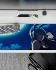36x16 inches anime desk pad in deep navy with cool cyan glow, midnight romance vibe, crisp shadows.