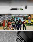 36x16 inches anime desk pad in warm oranges, leafy greens, and crisp ninja blues, sunny playful vibe.