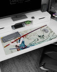 Silver-haired anime swordswoman on 36x16 inches desk pad, red-wrapped katana under blossoms with smoky skull.