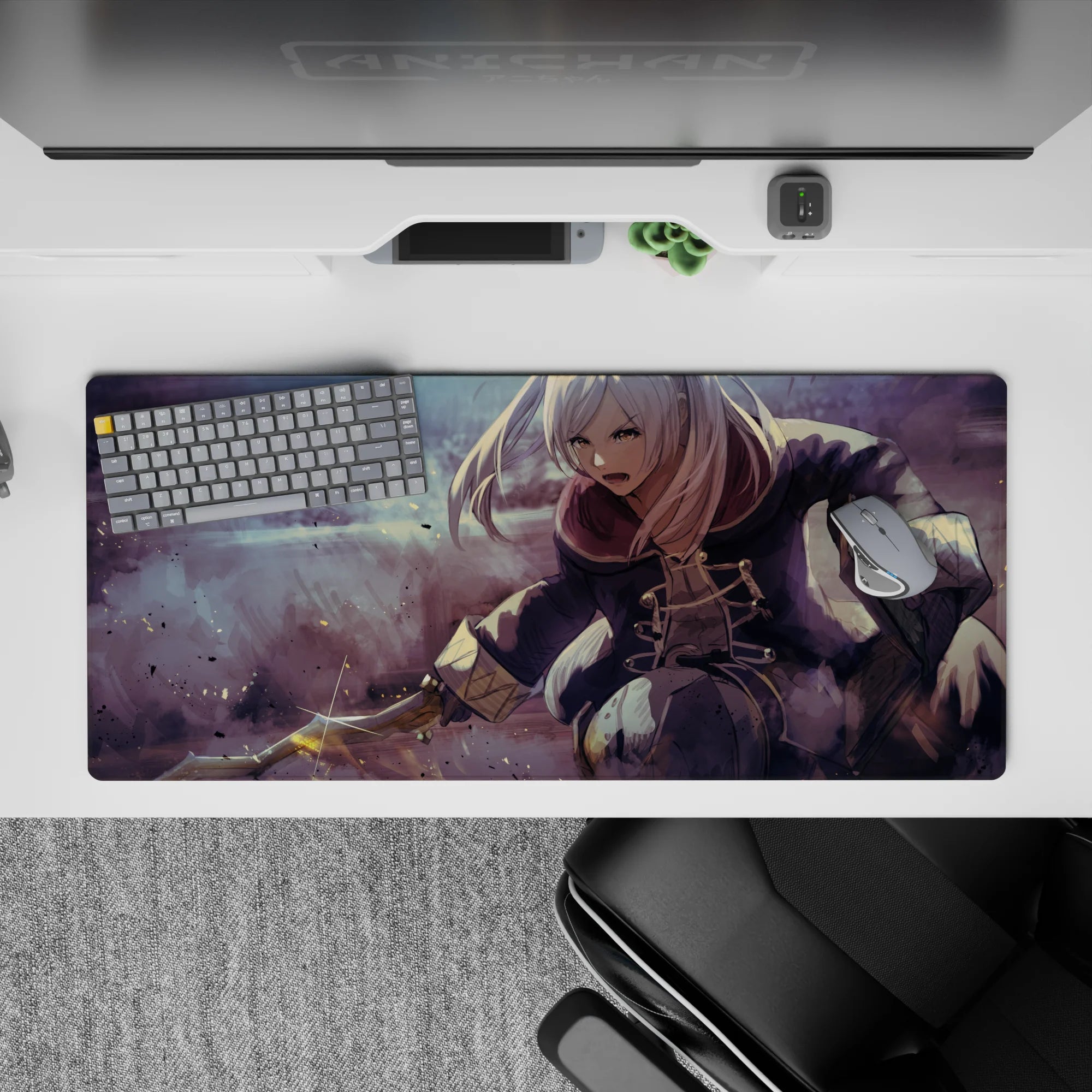 Anime girl desk pad 36x16 inches in smoky mauve and dusty gray purples, ink specks and fast action vibe.