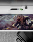 Anime girl desk pad 36x16 inches in smoky mauve and dusty gray purples, ink specks and fast action vibe.