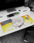 Sleepy chibi anime girl with creamy blonde hair and blank eyes on a desk pad 36x16 inches.