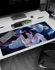 Albedo from Overlord on a 40x20 inches anime mouse pad; her golden eyes and dark wings against a blue-violet backdrop.