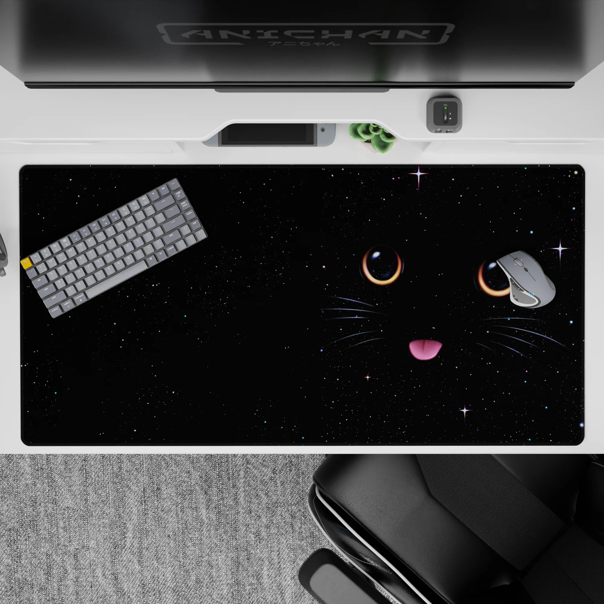 Dark space-black 40x20 inches desk pad with warm glowing eyes, silver whiskers, and a cozy vibe.