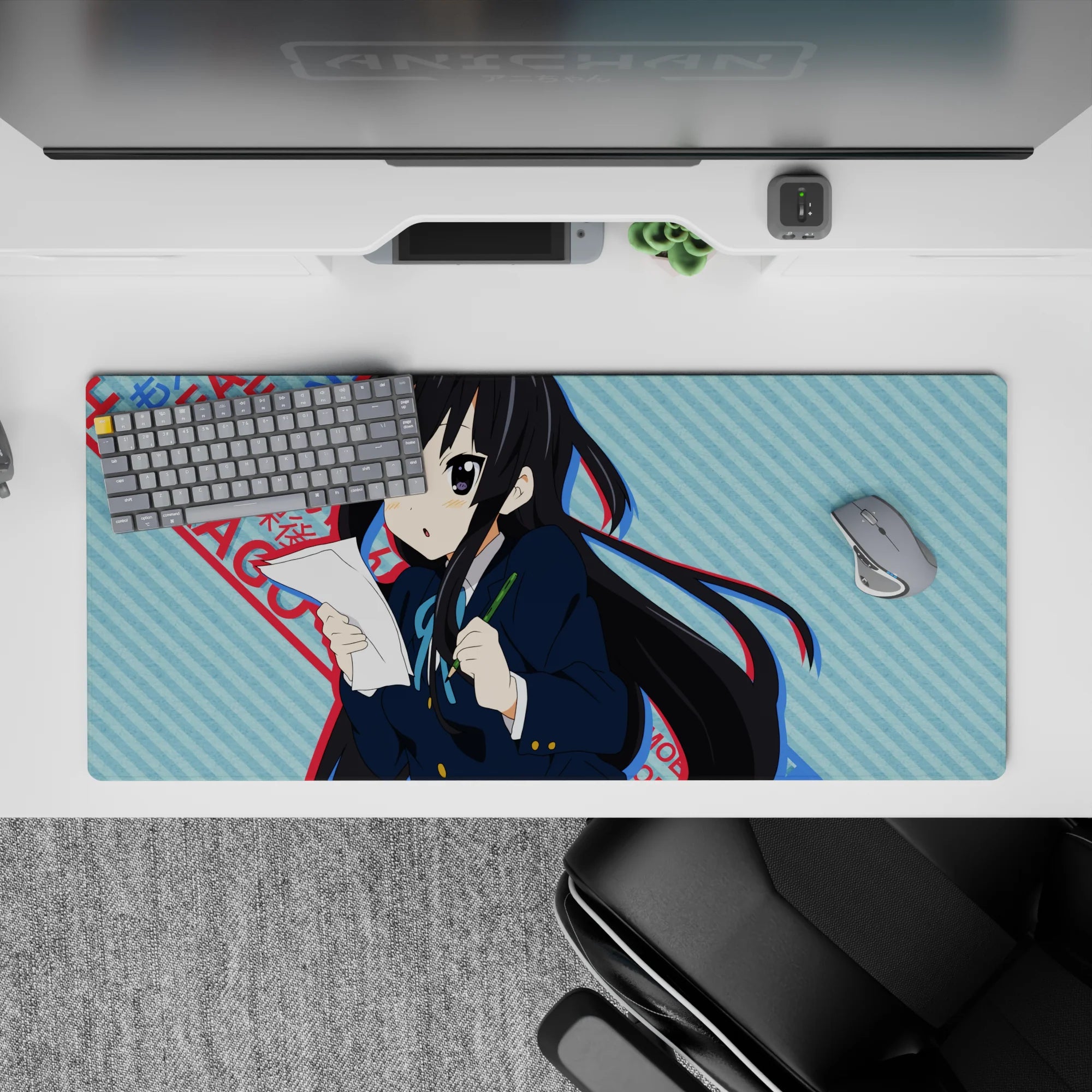 36x16 inches anime girl mouse pad in cool blue stripes and punchy red text, cute-serious vibe for desk setups.