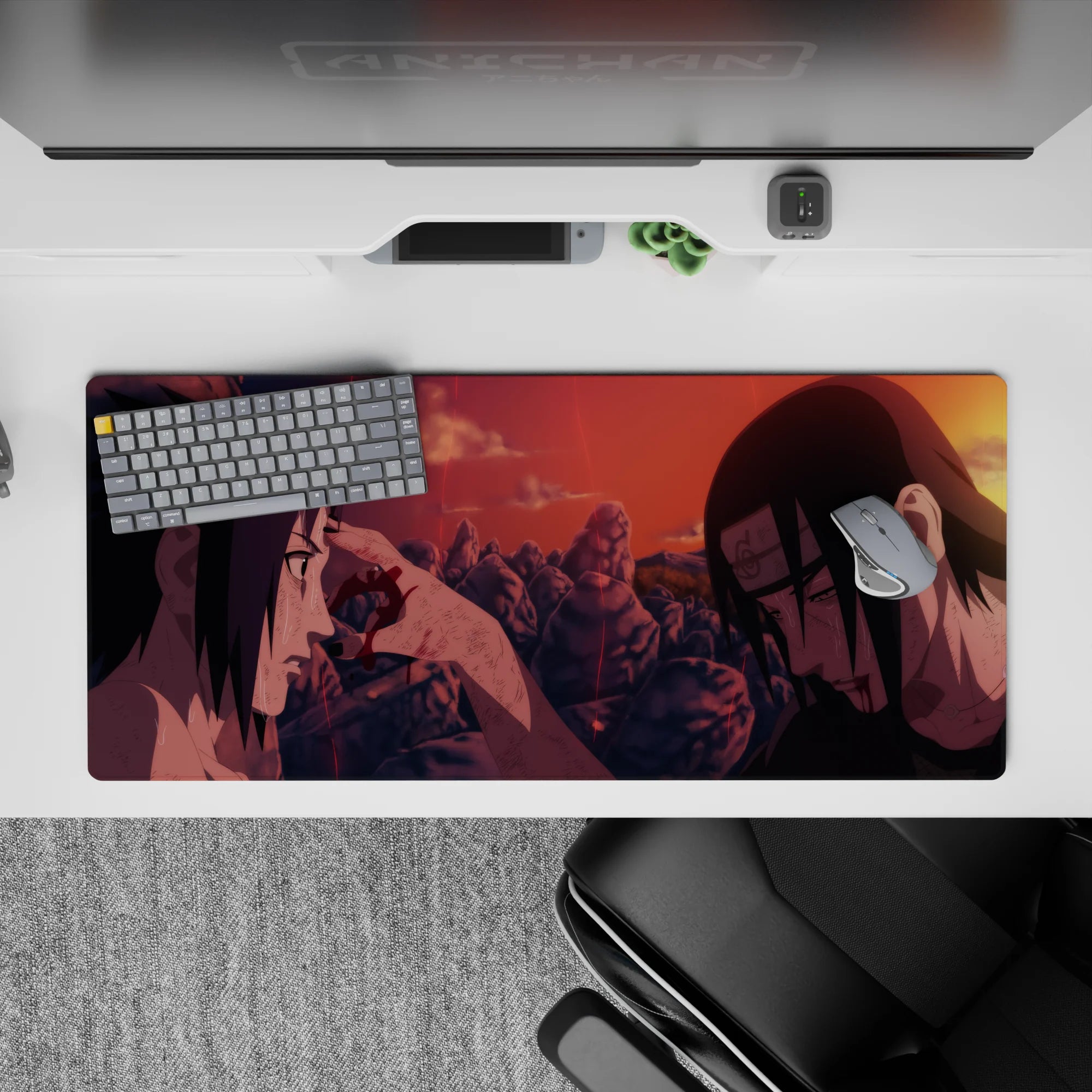 36x16 inches anime desk pad in sunset reds and burnt orange, quiet tragic vibe with glowing embers.