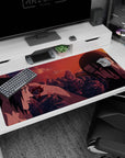 Sasuke and Itachi Uchiha facing each other at dusk on anime desk pad, 40x20 inches.