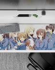 Playful pastel anime desk pad 36x16 inches in soft blues and white space with drifting pink petals.
