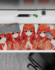 36x16 inches anime girl desk pad in warm peach and orange tones, big sapphire eyes, playful cheering mood.