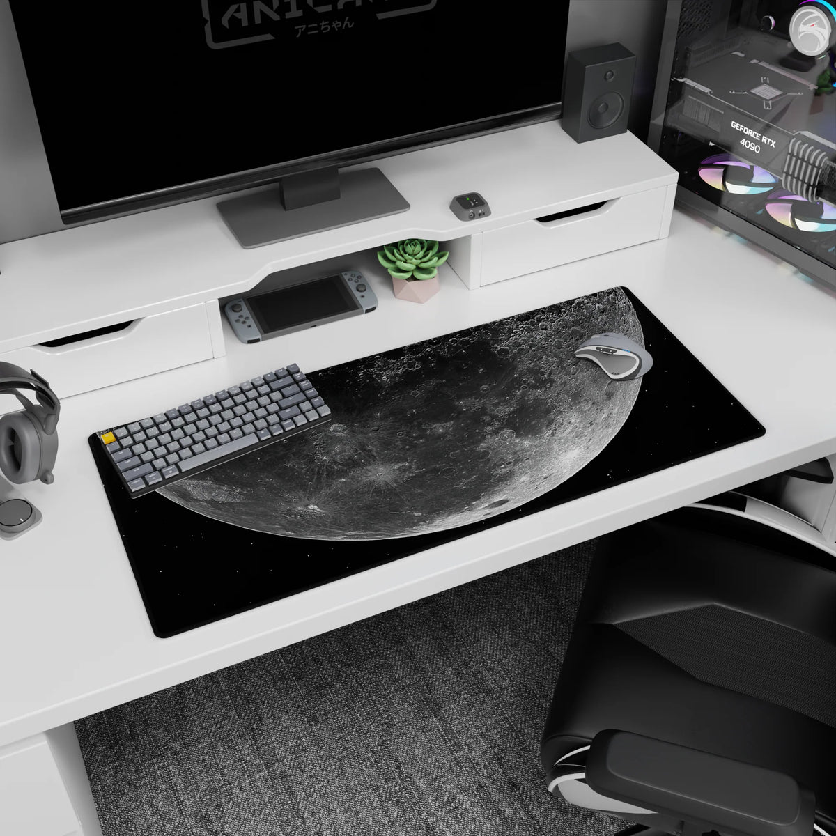 Cratered full moon floating in star-speckled space desk pad 36x16 inches, minimalist sci-fi look.