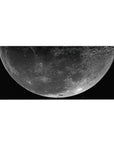 Giant moon over deep space desk pad 36x16 inches with crater detail and scattered stars.
