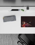 Anime mouse pad featuring Megumin from KonoSuba, size 14x10 inches, with a plum backdrop highlighting her red outfit and staff.