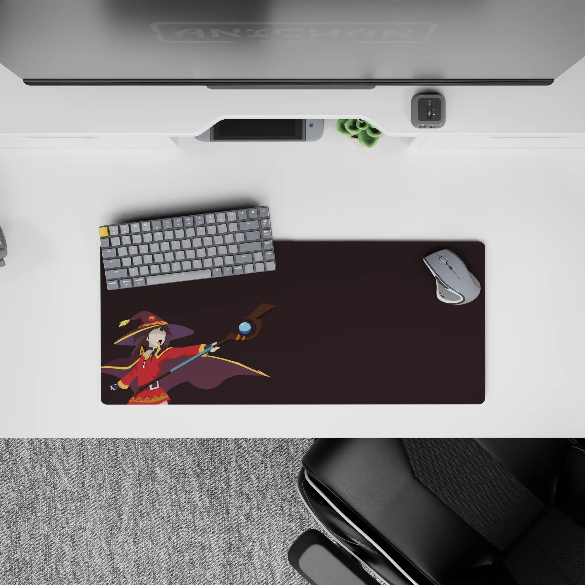 Mouse pad featuring Megumin from KonoSuba, size 28x12 inches. Bold design with dramatic colors capturing her iconic &quot;Explosion!&quot;.