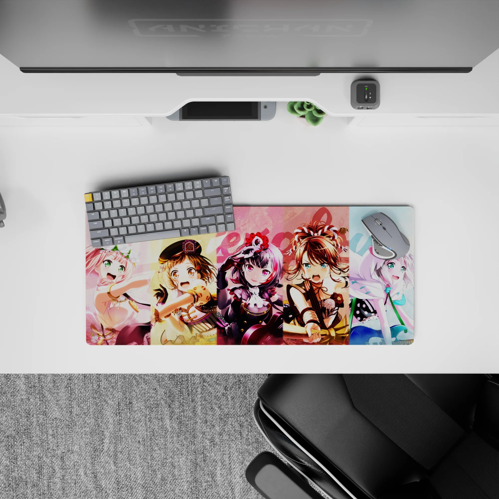 28x12 inches pastel anime desk mat in yellow, pink, and cool blue, bright loud playful stage vibe.