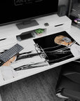 Light Yagami and L face-off anime desk pad 40x20 inches, calm expressions split by black streaks.