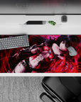 Dark fantasy anime desk pad 36x16 inches in glossy reds, smoky shadows, and red sparks with neon sheen.