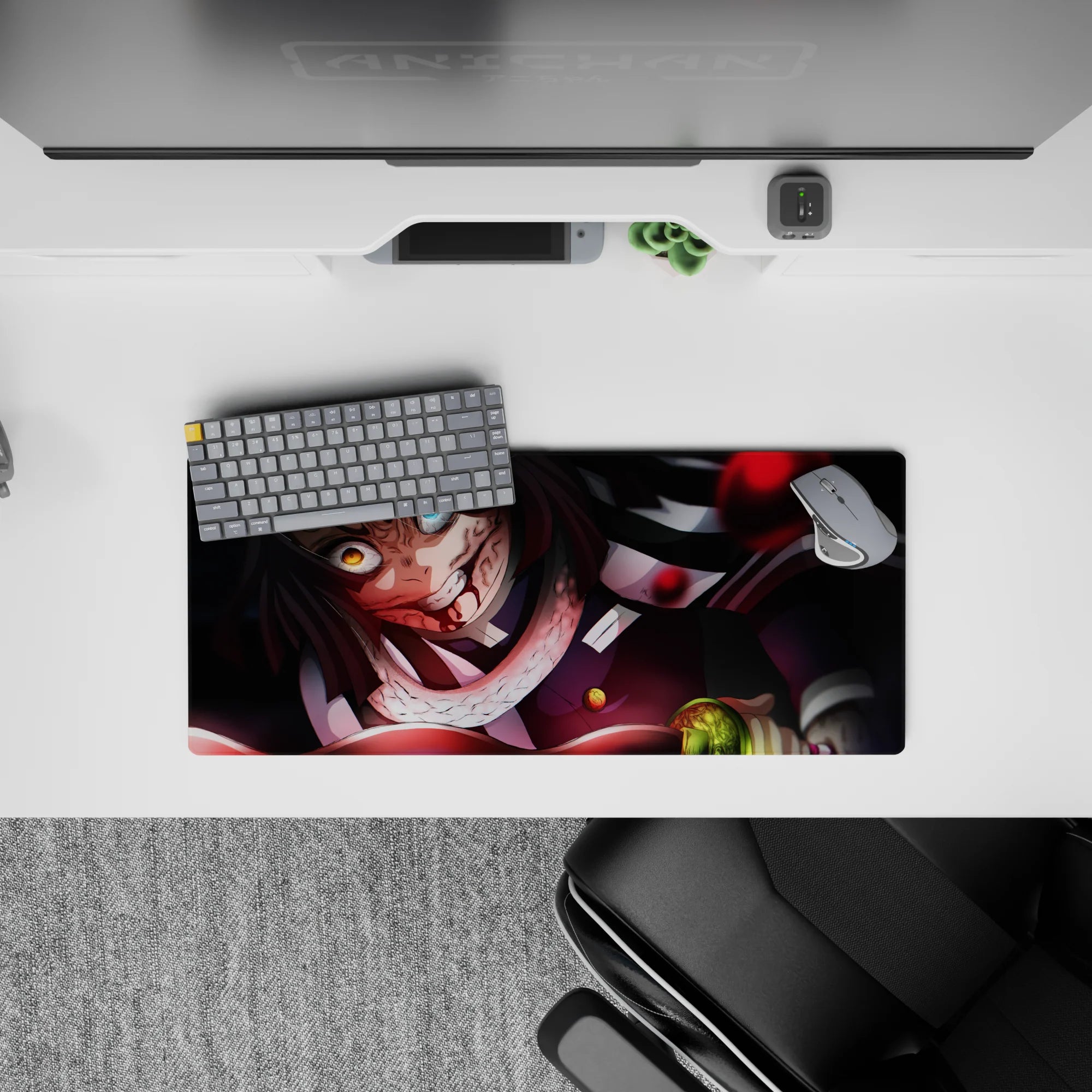 Anime mouse pad 28x12 inches featuring Obanai Iguro in battle, serpent coiled, with a black and crimson color scheme.