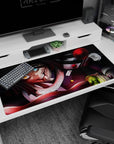 Anime desk pad 40x20 inches featuring Obanai Iguro mid-battle with serpent, vivid black and crimson tones.