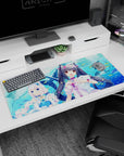 36x16 inches anime desk pad featuring two catgirls with ribbons and glossy eyes cuddling plush whales.