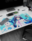 40x20 inches anime desk pad showing two catgirls cuddling plush whales amid fish in a watery scene.