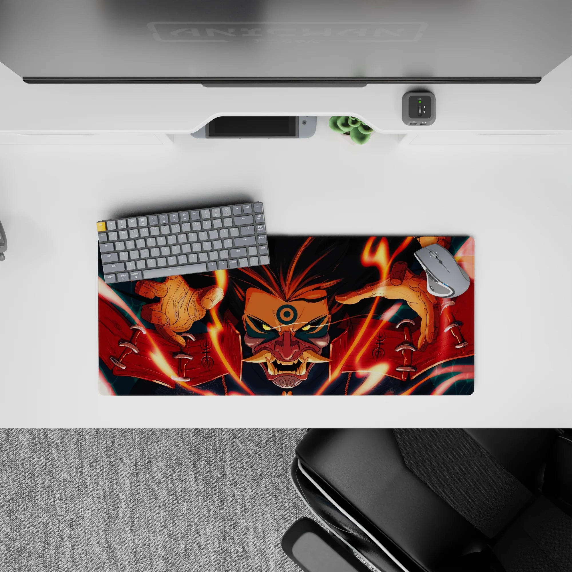 28x12 inches Naruto-inspired desk mouse pad in fiery orange, deep reds and midnight blues, intense vibe.