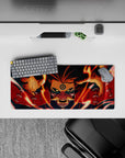 28x12 inches Naruto-inspired desk mouse pad in fiery orange, deep reds and midnight blues, intense vibe.